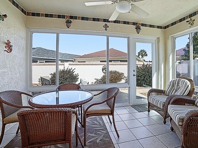 WARM AND WELCOMING this Beauregard villa is nestled in Greenwood on Oakleigh Executive Golf Course in Florida - for sale on GolfHomes.com, golf home, golf lot