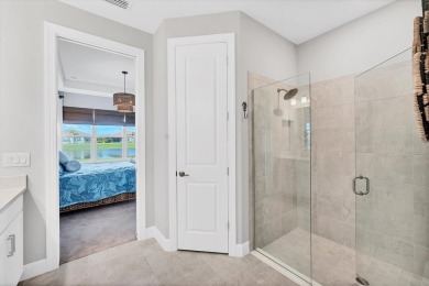 Step into paradise at 3025 Veneto Court, an upgraded on Esplanade Golf and Country at Lakewood Ranch in Florida - for sale on GolfHomes.com, golf home, golf lot
