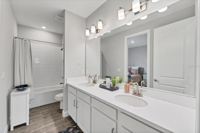 Step into paradise at 3025 Veneto Court, an upgraded on Esplanade Golf and Country at Lakewood Ranch in Florida - for sale on GolfHomes.com, golf home, golf lot