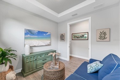 Step into paradise at 3025 Veneto Court, an upgraded on Esplanade Golf and Country at Lakewood Ranch in Florida - for sale on GolfHomes.com, golf home, golf lot