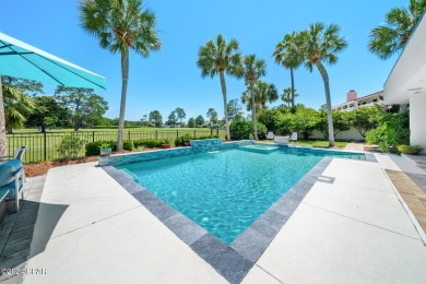 Simply stunning and spacious, custom home situated on a double on Holiday Golf Club in Florida - for sale on GolfHomes.com, golf home, golf lot