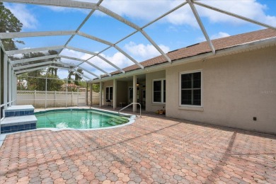 Discover the potential of this charming 3 bed, 3 bath pool home on The Grand Club Cypress Course in Florida - for sale on GolfHomes.com, golf home, golf lot