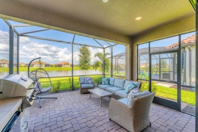 Step into paradise at 3025 Veneto Court, an upgraded on Esplanade Golf and Country at Lakewood Ranch in Florida - for sale on GolfHomes.com, golf home, golf lot