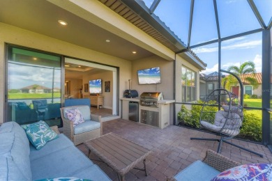 Step into paradise at 3025 Veneto Court, an upgraded on Esplanade Golf and Country at Lakewood Ranch in Florida - for sale on GolfHomes.com, golf home, golf lot