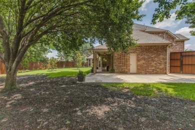 Welcome to this elegant home in the exclusive gated community of on Firewheel Golf Park in Texas - for sale on GolfHomes.com, golf home, golf lot