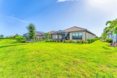 Step into paradise at 3025 Veneto Court, an upgraded on Esplanade Golf and Country at Lakewood Ranch in Florida - for sale on GolfHomes.com, golf home, golf lot
