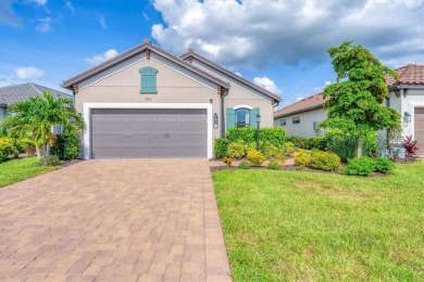 Step into paradise at 3025 Veneto Court, an upgraded on Esplanade Golf and Country at Lakewood Ranch in Florida - for sale on GolfHomes.com, golf home, golf lot