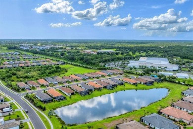 Step into paradise at 3025 Veneto Court, an upgraded on Esplanade Golf and Country at Lakewood Ranch in Florida - for sale on GolfHomes.com, golf home, golf lot
