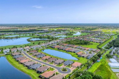 Step into paradise at 3025 Veneto Court, an upgraded on Esplanade Golf and Country at Lakewood Ranch in Florida - for sale on GolfHomes.com, golf home, golf lot