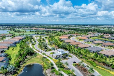 Step into paradise at 3025 Veneto Court, an upgraded on Esplanade Golf and Country at Lakewood Ranch in Florida - for sale on GolfHomes.com, golf home, golf lot