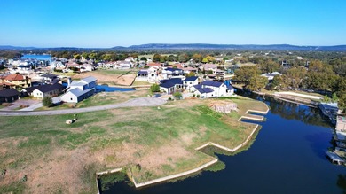 Rare opportunity to own a waterfront, half-acre lot in on Legends Golf Course in Texas - for sale on GolfHomes.com, golf home, golf lot