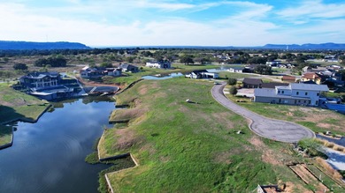 Rare opportunity to own a waterfront, half-acre lot in on Legends Golf Course in Texas - for sale on GolfHomes.com, golf home, golf lot