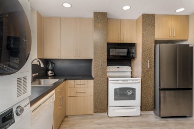 Uniquely reconfigured corner unit with 330 sq ft of additional on Fountains Golf and Country Club in Florida - for sale on GolfHomes.com, golf home, golf lot