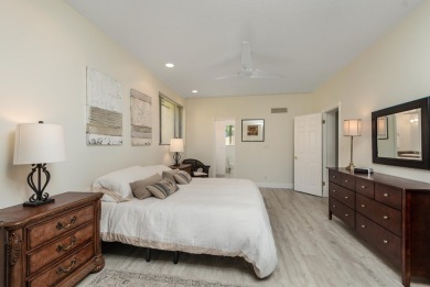 Uniquely reconfigured corner unit with 330 sq ft of additional on Fountains Golf and Country Club in Florida - for sale on GolfHomes.com, golf home, golf lot