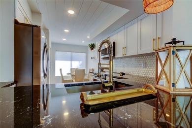 Rare 3 bedroom properties in Isla Del Sol are GOLD - and on Isla Del Sol Yacht and Country Club in Florida - for sale on GolfHomes.com, golf home, golf lot