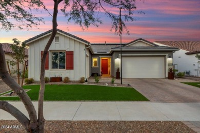 Sleek, modern house with an open-concept floor plan that offers on Verrado Golf Club - Victory in Arizona - for sale on GolfHomes.com, golf home, golf lot