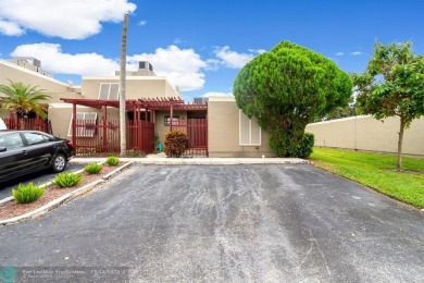 Welcome to this exceptional corner townhouse in the heart of on Pembroke Lakes Golf Club in Florida - for sale on GolfHomes.com, golf home, golf lot