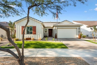 Sleek, modern house with an open-concept floor plan that offers on Verrado Golf Club - Victory in Arizona - for sale on GolfHomes.com, golf home, golf lot