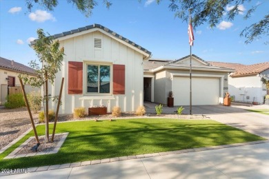 Sleek, modern house with an open-concept floor plan that offers on Verrado Golf Club - Victory in Arizona - for sale on GolfHomes.com, golf home, golf lot