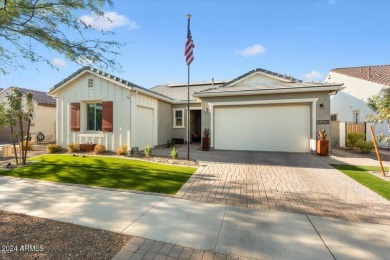 Sleek, modern house with an open-concept floor plan that offers on Verrado Golf Club - Victory in Arizona - for sale on GolfHomes.com, golf home, golf lot