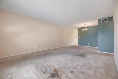 Investor Special in On Top of the World! This 2-bedroom on On Top Of The World Golf Course in Florida - for sale on GolfHomes.com, golf home, golf lot