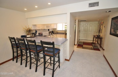Exclusive, gated, private, and Turn-key! Island location just on London Bridge Golf Course in Arizona - for sale on GolfHomes.com, golf home, golf lot