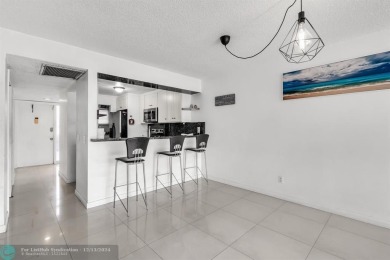 Welcome to this exceptional corner townhouse in the heart of on Pembroke Lakes Golf Club in Florida - for sale on GolfHomes.com, golf home, golf lot