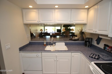Exclusive, gated, private, and Turn-key! Island location just on London Bridge Golf Course in Arizona - for sale on GolfHomes.com, golf home, golf lot