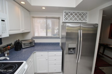Exclusive, gated, private, and Turn-key! Island location just on London Bridge Golf Course in Arizona - for sale on GolfHomes.com, golf home, golf lot