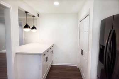 Discover this beautifully renovated mid-level unit in a gated on Cross Creek Golf Course in Georgia - for sale on GolfHomes.com, golf home, golf lot