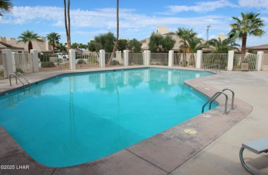 Exclusive, gated, private, and Turn-key! Island location just on London Bridge Golf Course in Arizona - for sale on GolfHomes.com, golf home, golf lot