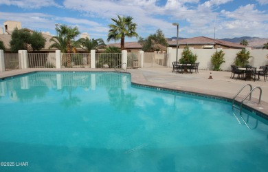 Exclusive, gated, private, and Turn-key! Island location just on London Bridge Golf Course in Arizona - for sale on GolfHomes.com, golf home, golf lot