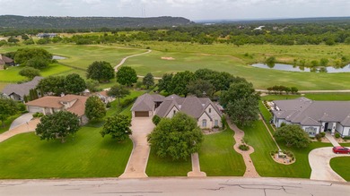 Nestled beneath an abundance of shade, located across the street on Legends Golf Course in Texas - for sale on GolfHomes.com, golf home, golf lot