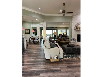 Nestled beneath an abundance of shade, located across the street on Legends Golf Course in Texas - for sale on GolfHomes.com, golf home, golf lot