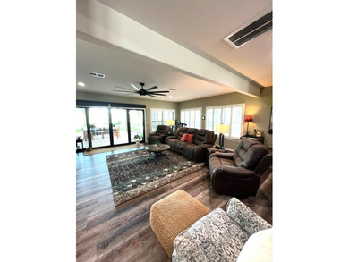 Nestled beneath an abundance of shade, located across the street on Legends Golf Course in Texas - for sale on GolfHomes.com, golf home, golf lot