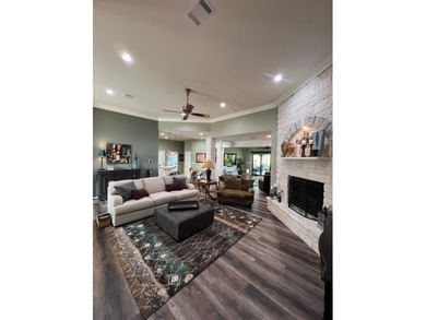 Nestled beneath an abundance of shade, located across the street on Legends Golf Course in Texas - for sale on GolfHomes.com, golf home, golf lot