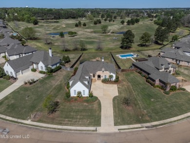 Overlooking the Hole 10 green at Lake Caroline! Located in on Lake Caroline Golf Club in Mississippi - for sale on GolfHomes.com, golf home, golf lot