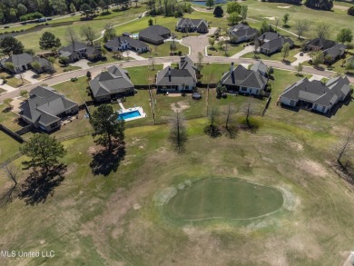 Overlooking the Hole 10 green at Lake Caroline! Located in on Lake Caroline Golf Club in Mississippi - for sale on GolfHomes.com, golf home, golf lot