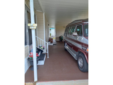 ***Your paradise on EASY ST*** Located in Rolling Greens Village on Rolling Greens Executive Golf Community in Florida - for sale on GolfHomes.com, golf home, golf lot