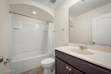 Live the Florida dream in this move‑in‑ready 3BR/2 on LPGA International Golf Course in Florida - for sale on GolfHomes.com, golf home, golf lot