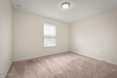 Live the Florida dream in this move‑in‑ready 3BR/2 on LPGA International Golf Course in Florida - for sale on GolfHomes.com, golf home, golf lot