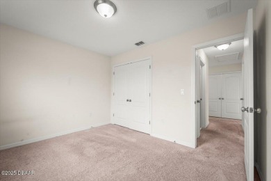 Live the Florida dream in this move‑in‑ready 3BR/2 on LPGA International Golf Course in Florida - for sale on GolfHomes.com, golf home, golf lot