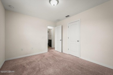 Live the Florida dream in this move‑in‑ready 3BR/2 on LPGA International Golf Course in Florida - for sale on GolfHomes.com, golf home, golf lot