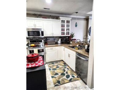 One-of-a-Kind Old Kinderhook Condo - Stunning Lake  Golf Course on The Club At Old Kinderhook in Missouri - for sale on GolfHomes.com, golf home, golf lot
