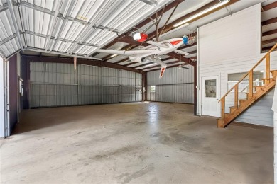 Right off of the airstrip. Discover the perfect blend of luxury on Pecan Plantation Country Club in Texas - for sale on GolfHomes.com, golf home, golf lot