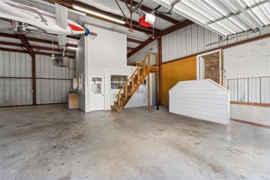 Right off of the airstrip. Discover the perfect blend of luxury on Pecan Plantation Country Club in Texas - for sale on GolfHomes.com, golf home, golf lot