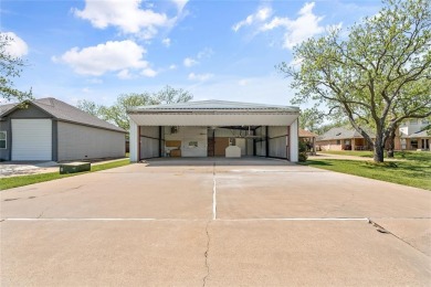 Right off of the airstrip. Discover the perfect blend of luxury on Pecan Plantation Country Club in Texas - for sale on GolfHomes.com, golf home, golf lot
