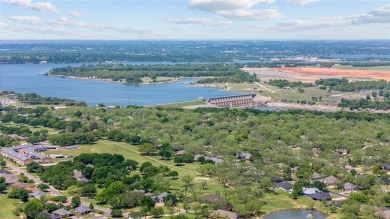 Right off of the airstrip. Discover the perfect blend of luxury on Pecan Plantation Country Club in Texas - for sale on GolfHomes.com, golf home, golf lot