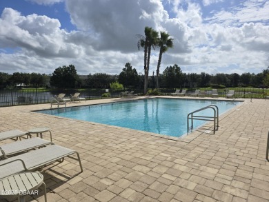 Live the Florida dream in this move‑in‑ready 3BR/2 on LPGA International Golf Course in Florida - for sale on GolfHomes.com, golf home, golf lot