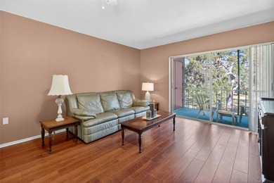 Relax and enjoy the serene views from your screened on East Lake Woodlands Country Club in Florida - for sale on GolfHomes.com, golf home, golf lot